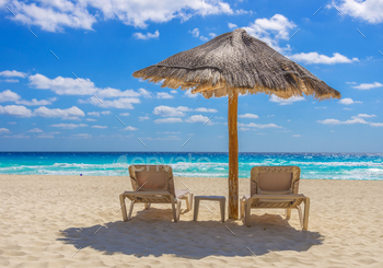 Beach chairs and umbrella / Photodune, Misc