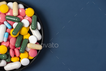 Many Colorful Pills and Tablets Medicine Drug on Copy Space Background / Photodune, Misc