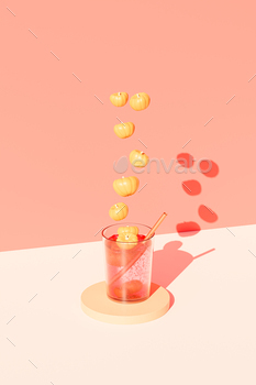 Drink in glass with pumpkins on beige background for advertising on autumn holidays or sales / Photodune, Misc