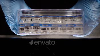 Glass vials for Covid-19 vaccine in laboratory. / Photodune, Misc