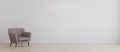 Empty room with white wall and armchair on wooden parquet. Room interior with armchair for mockup - PhotoDune Item for Sale