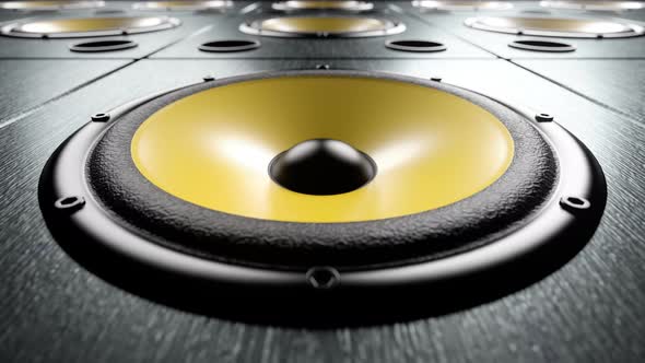 Close-up of Audio Speaker with Yellow Membrane Playing Rhythmic Club Dance Music