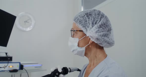 An ENT Examines the Patient's Sinuses Using a Medical Mini Camera