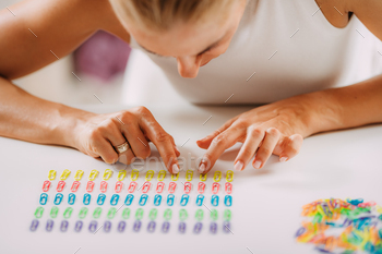 Obsessive compulsive disorder. Arranging Paperclips in a Row. / Photodune, Misc