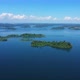 Drone Flies Over A Large Blue Lagoon, With Islands Full Of Green Trees, Paradise In Brazil - VideoHive Item for Sale