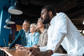 cinematic image of a multiethnic business team / Photodune, Misc