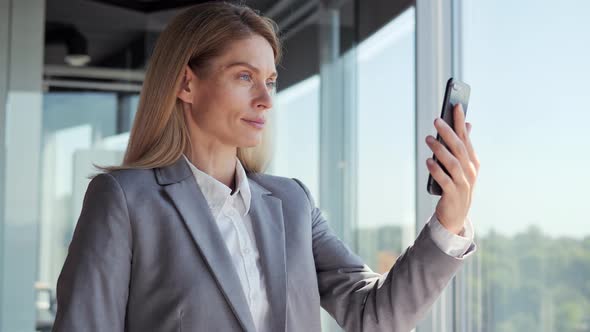 Business Woman Having Video Call on Smartphone in Slow Motion