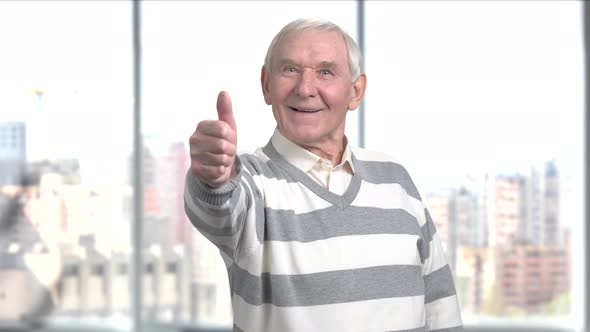 Elderly Man with Thumb Up Gesture.