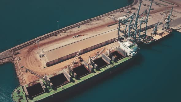 Aerial Working Shipyard on Blue Ocean Water