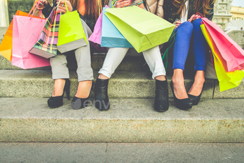 Girls with shopping on sale bags