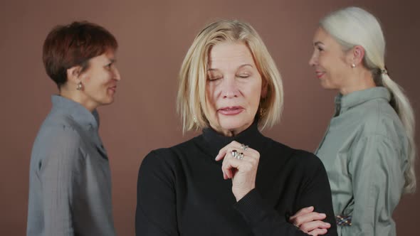 Portrait of Mature Woman with Girlfriends in Studio