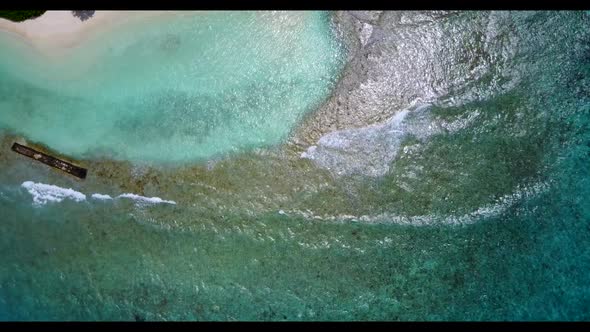 Aerial top view texture of relaxing bay beach vacation by clear sea with white sandy background of a