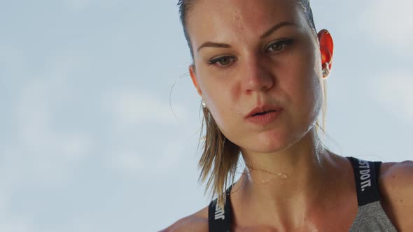 Woman sweating during workout