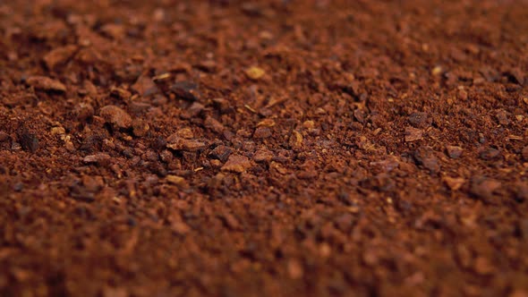 Roasted crushed chicory root powder. Brown instant herbal granules. Macro