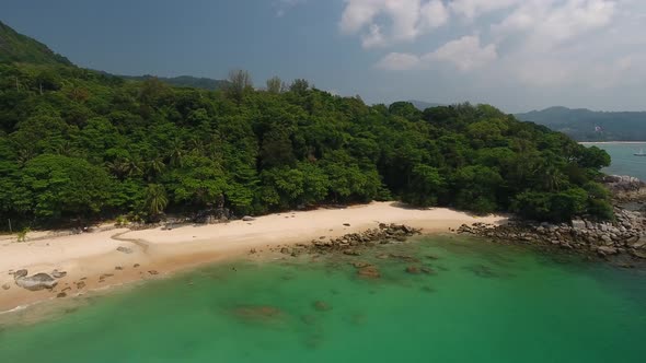 Aerial side shot of a beautiful beach in southern Thailand