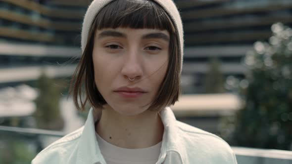 Portrait of Young Woman Posing Near Modern Shopping Mall