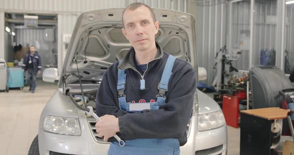 Portrait Of A Friendly Car Mechanic