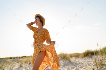 stylish attractive slim smiling woman on beach in summer style fashion trend outfit / Photodune, Misc