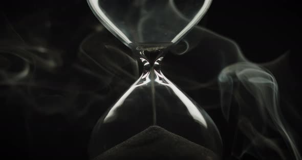 Beautiful smoke surrounding an hourglass