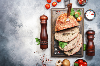 Traditional Meatloaf with mashrooms, baked pork beef minced meat on wooden cutting board / Photodune, Misc