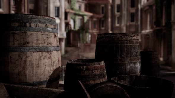 Old Wooden Wine Barrels in a Sea Town Port