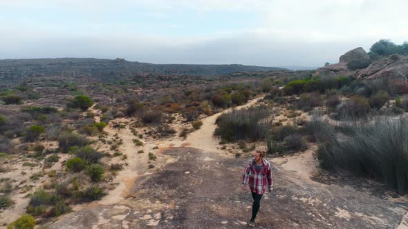 Man walking on a rocky path 