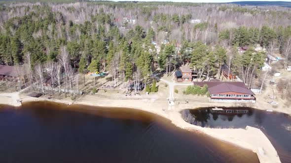 Aerial View of the Vuoksi River, the Forest and the Settlement in Autumn Day, Losevo, Leningrad