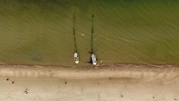Aerial view of fishing boats on seashore