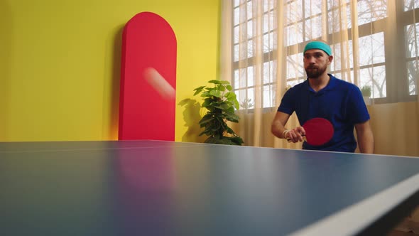 Great Looking Guy Ping Pong Player Hitting and