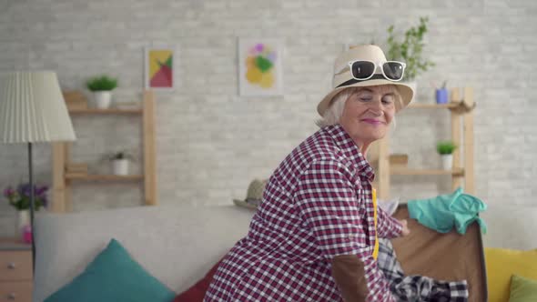 Smiling Old Woman Going Vacation Trying Clothes Front Mirror Close Up