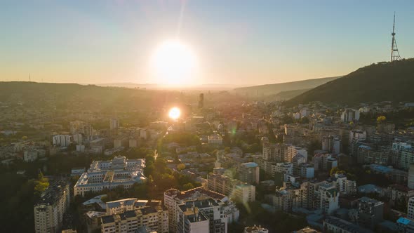 Aerial hyperlapse of beautiful cityscape of Tbilisi at sunrise, Georgia 2021