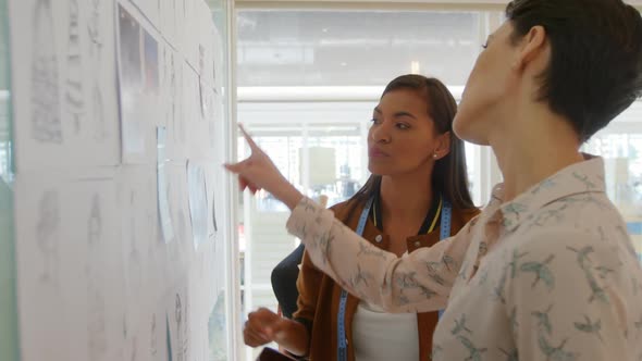 Young women working in a creative office