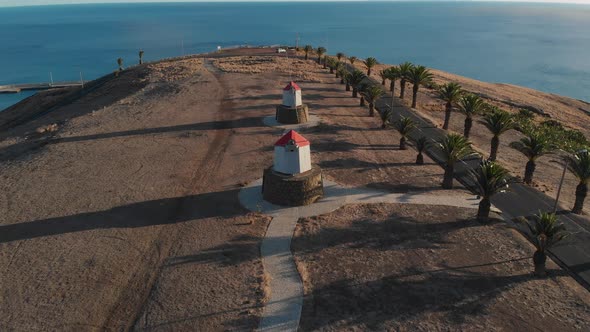 Aerial forward over abandoned windmills in Porto Santo island, Portugal