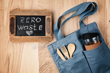 Flat lay of Zero waste kit. Set of eco friendly bamboo cutlery, cotton bag. Sustainable, ethical / Photodune, Misc