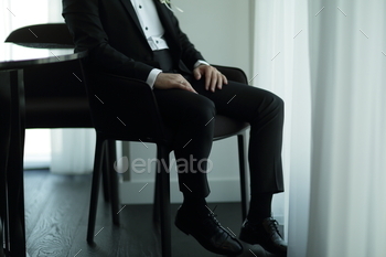 Groom sitting and waiting / Photodune, Misc
