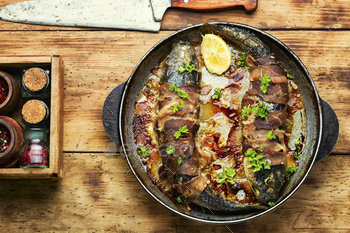 Baked fish wrapped in bacon / Photodune, Misc