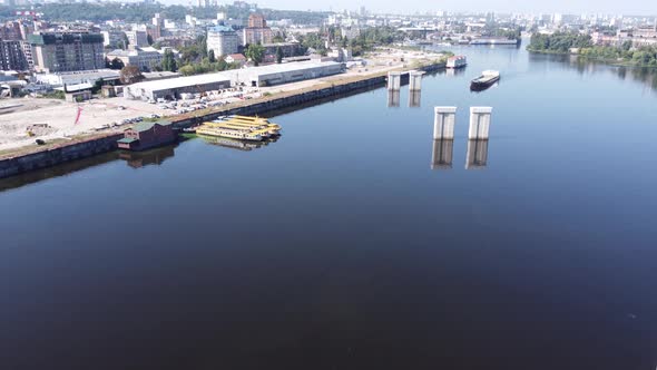 A Dry Cargo Ship Pushes an Empty Barge Down the Dnieper River