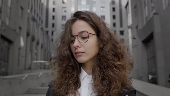 Portrait Of Young Girl On City Street