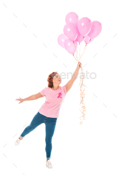 cheerful woman holding bunch of pink balloons isolated on white, breast cancer concept / Photodune, Misc