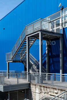 Fire escape ladder of a modern commercial building / Photodune, Misc