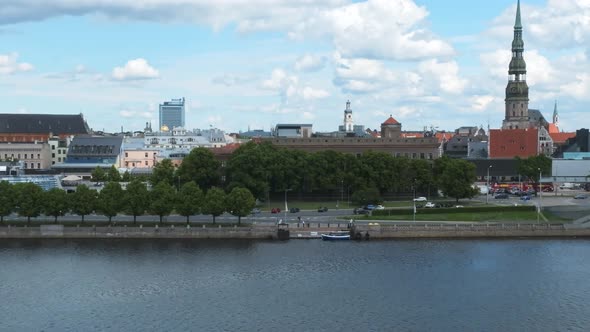 Beautiful Sunny Day with Clouds Going Over the Center of the City