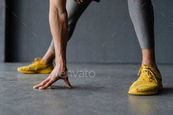 Young shirtless sportsman doing exercise while working out indoors / Photodune, Misc