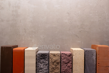 Construction brick at cement background. Stack of bricks and wall texture / Photodune, Misc
