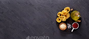 Pasta food  ingredients on table background. Raw pasta fettuccine / Photodune, Misc