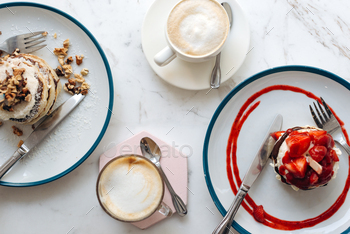 Pancakes and coffee for breakfast in a coffee shop. / Photodune, Misc