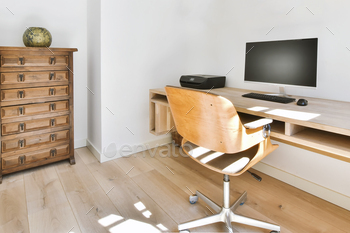 Home office with wall mounted table and bookshelves / Photodune, Misc
