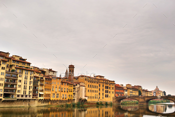 The embankment and bridge of the Holy Trinity of the Ponte Santa Trinita on the Arno river in / Photodune, Misc