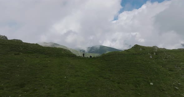 passing over tourists heads with opening beautiful view on mountain valley