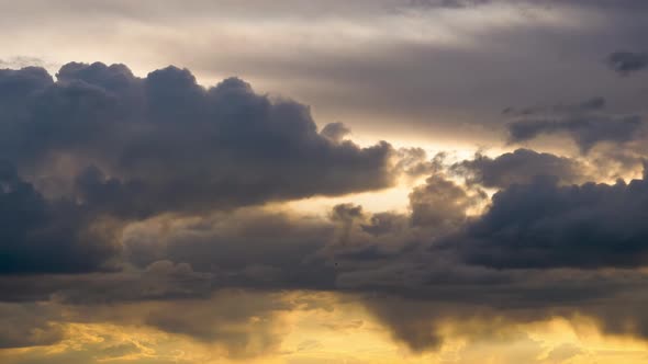 Stormy Clouds Move Smoothly in the Red Sky at Sunset. Timelapse. Cloud Space.