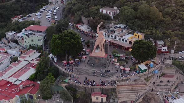 AERIAL: Guanajuato City and The Pipila, Mexico (Flying Away)